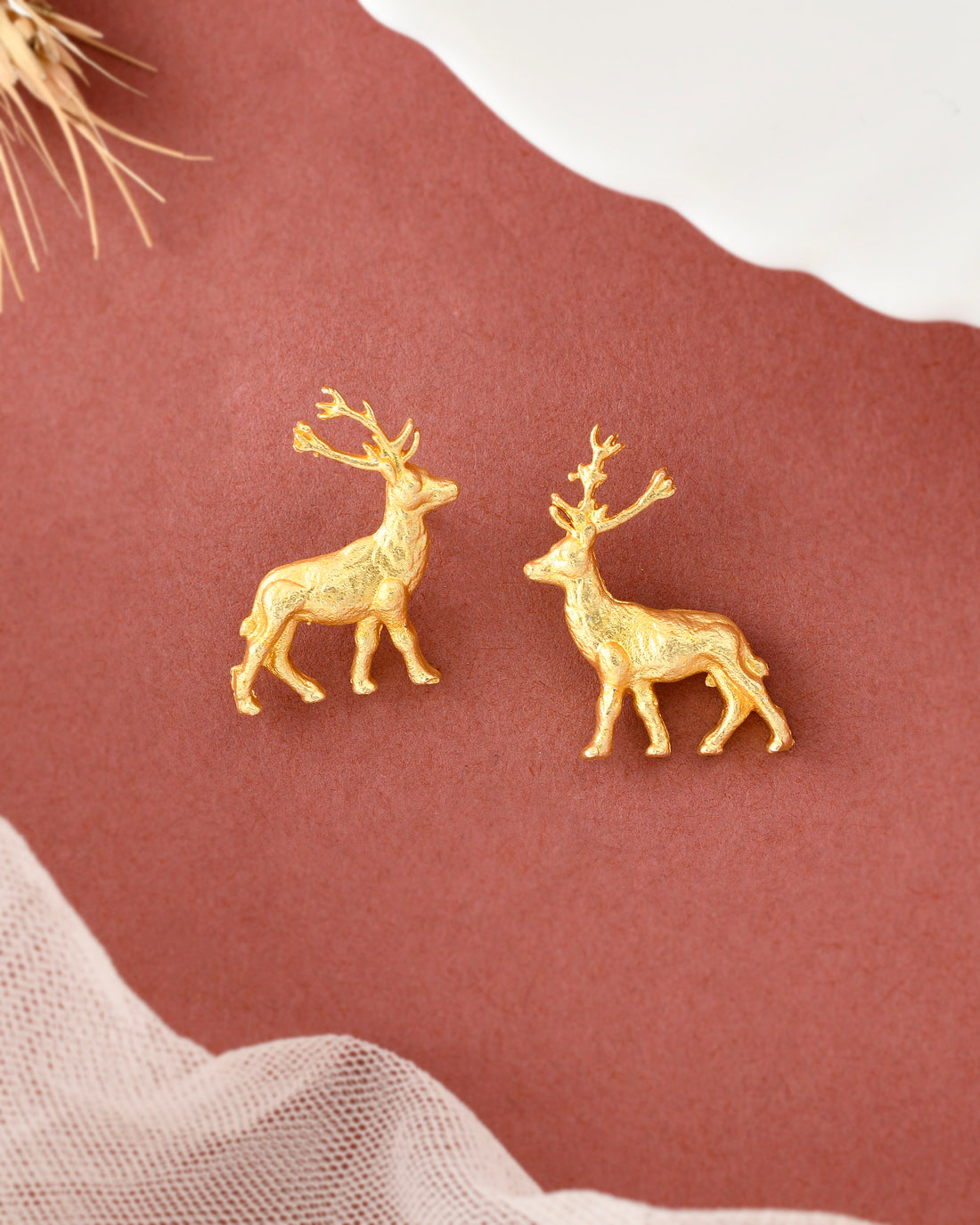 ALLURING REINDEER STUDS