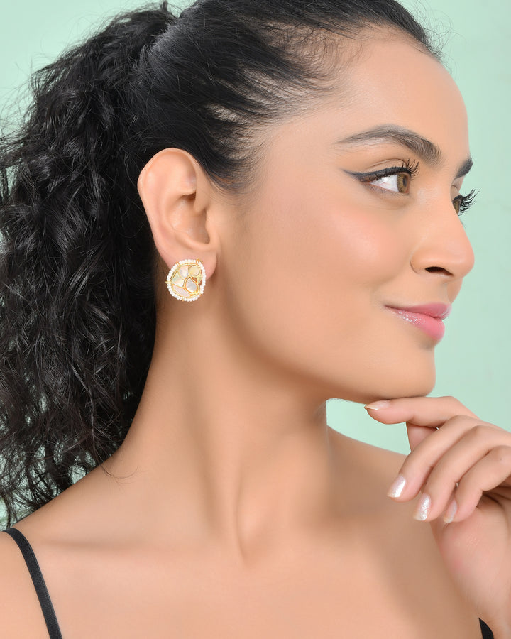 PEACOCK SHELL STUDS